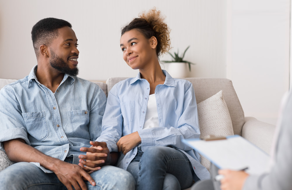 A couple practicing active listening exercises